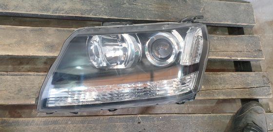 Фара левая ксенон Suzuki Grand Vitara 2 (JT) 05-15 Б/У Оригинал 10059088
