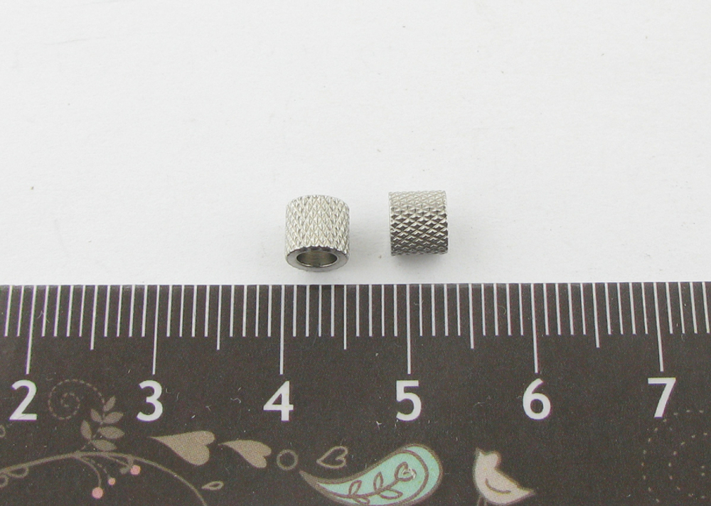k172 Бусина-цилиндр рельефная 5*4мм, нерж. сталь