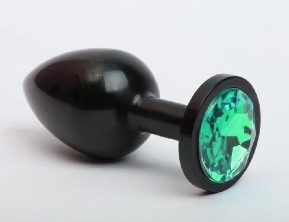Чёрная анальная пробка с зелёным стразом - 7,6 см. (Цвет: зеленый)