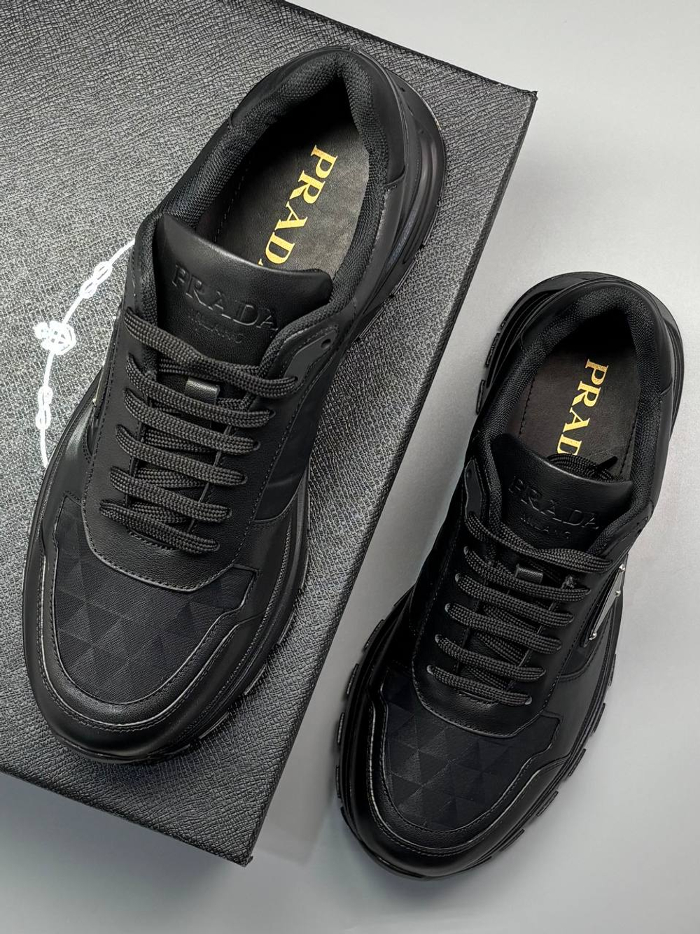 Кроссовки Prada