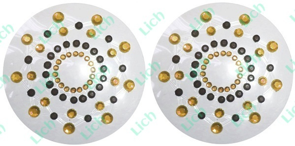 Украшение золотого цвета со стразами для сосков