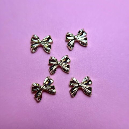 1853 Фигурки объёмные "Бантики" металл 5 шт