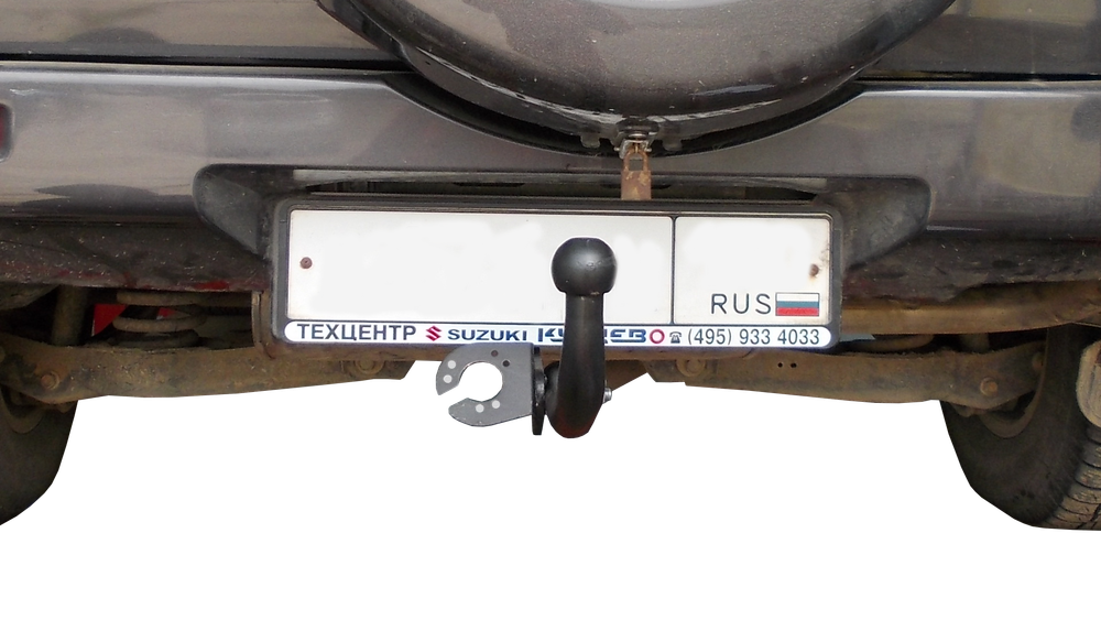 Фаркоп Suzuki Grand Vitara 5 дверей 2005-2016 (двигатель 2 л, авто с запасным колесом на двери), условно-съемный,(без электрики) Трейлер.7900