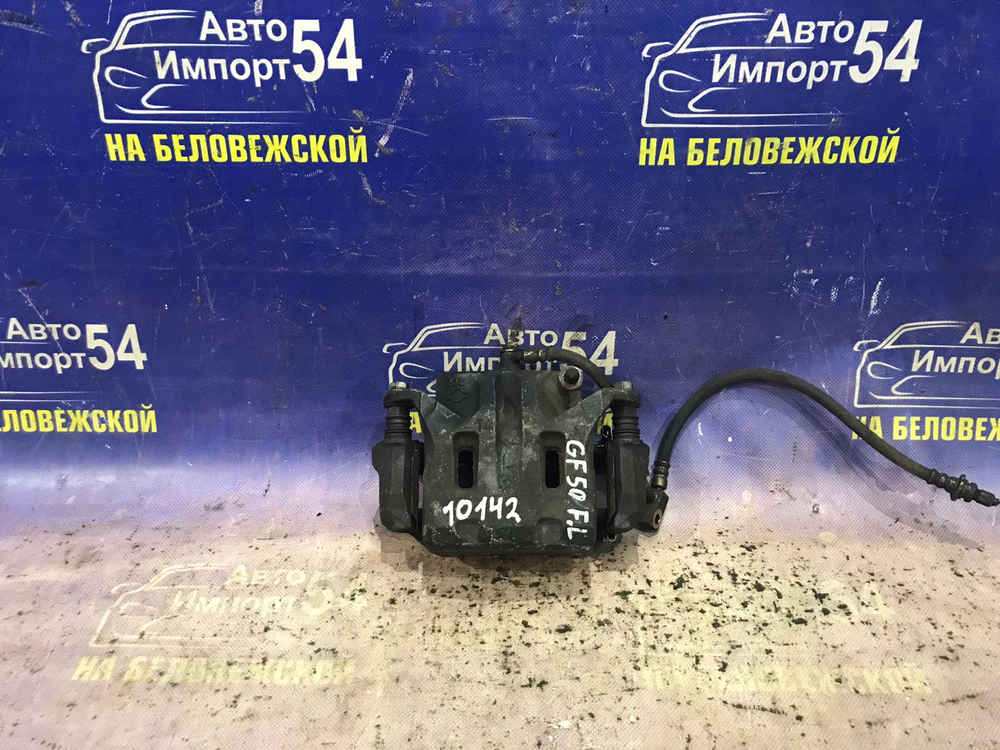 Суппорт тормозной передний левый NISSAN CIMA 2001-2010