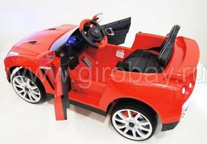 Детский электромобиль River Toys Nissan GTR X333XX красный