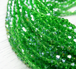 ББ021ДС4 Хрустальные бусины "биконус", цвет: зеленый AB прозр., размер 4 мм, кол-во: 95-100 шт.
