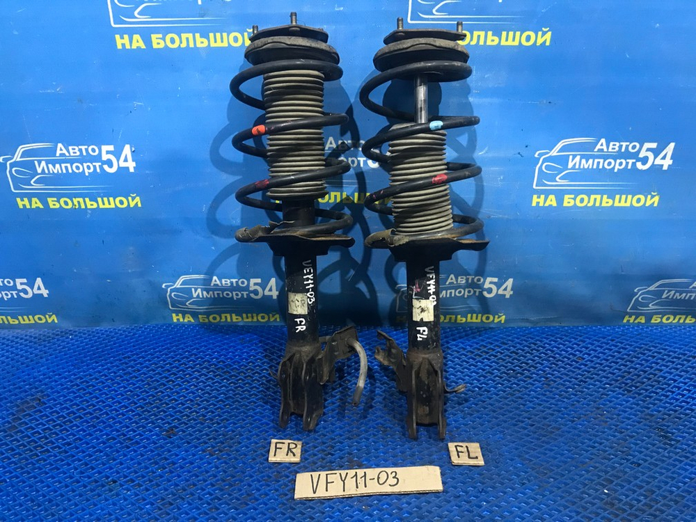 Стойка передняя левая NISSAN AD 2001