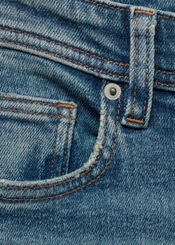 Джинсы Jan slim fit среднего тона с эффектом потертости