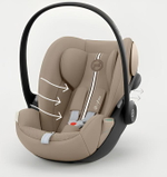 Коляска Cybex Coya Matt Black Frame Cloud G i-Size Almond Beige Plus Leaf Green с дождевиком