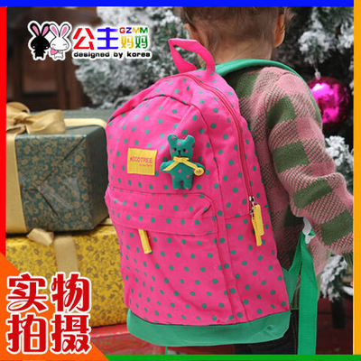 Рюкзак детский в горох с контрастным днищем и игрушкой