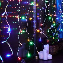 ULD-C3020-384-DTA-RC MULTI IP44 Занавес светодиодный. 3х2м. 384 светодиода. Разноцветный свет. Провод прозрачный. Пульт ДУ в-к. TM Uniel