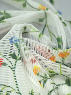 Сетка эластичная белая с зеленым цветочным принтом метражом