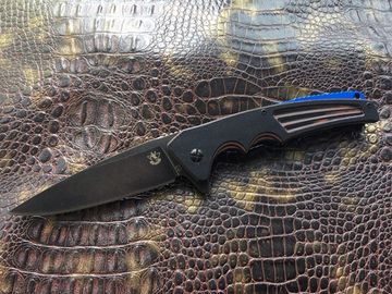 Складной нож Steelclaw Бузун SLW06 c клинком из стали D2, рукоять G10