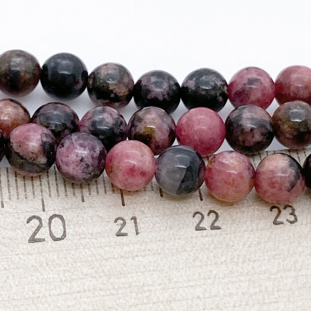 Родонит (высокое качество), диаметр 6,3-6,5 мм, цена за 14-15 шт (1/4 нити)