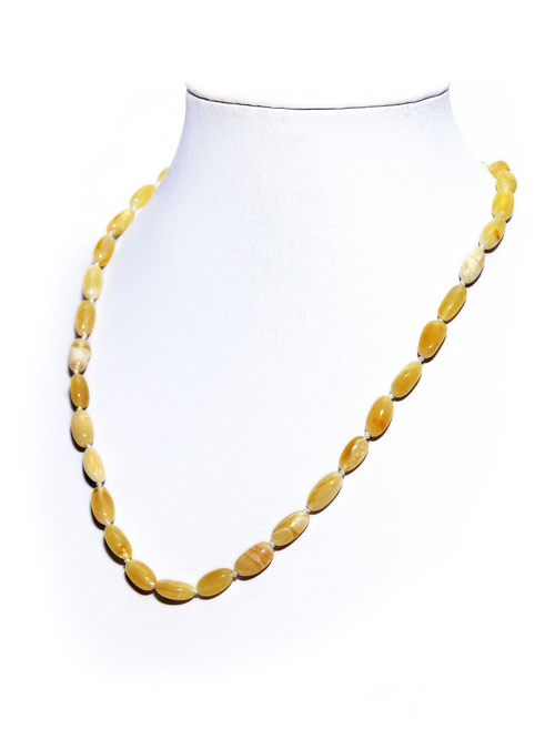 Бусы из янтаря натурального. Длина 45 см, бусины 10 на 7 мм. Янтарные бусы женские лечебные