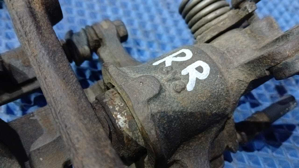 Суппорт тормозной задний правый NISSAN PRIMERA 1998