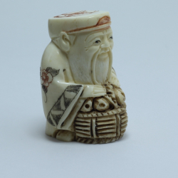 Нэцкэ Дзюродзин с корзиной фруктов