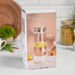 Кувшин из стекла с металлической крышкой