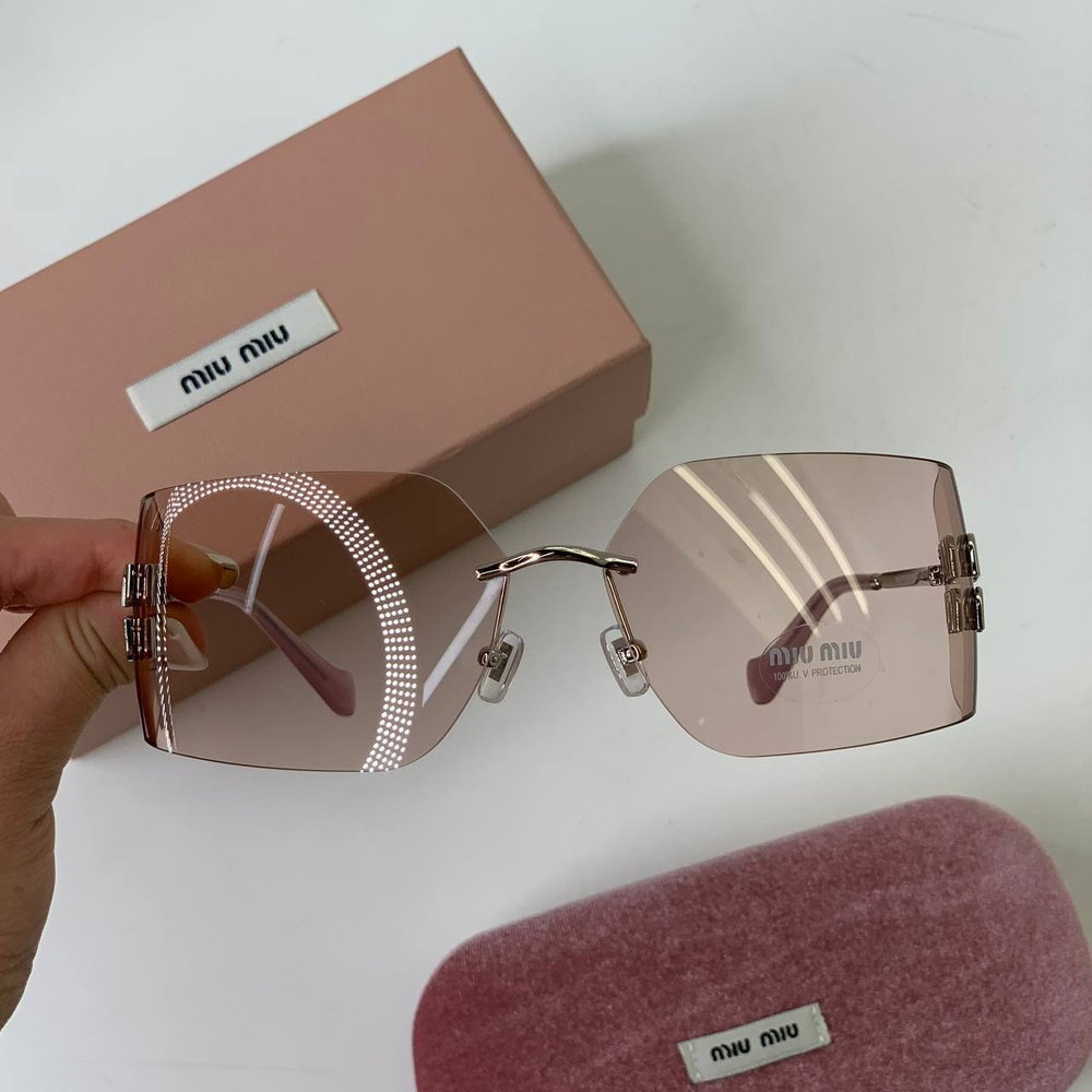 Солнцезащитные очки MIU MIU