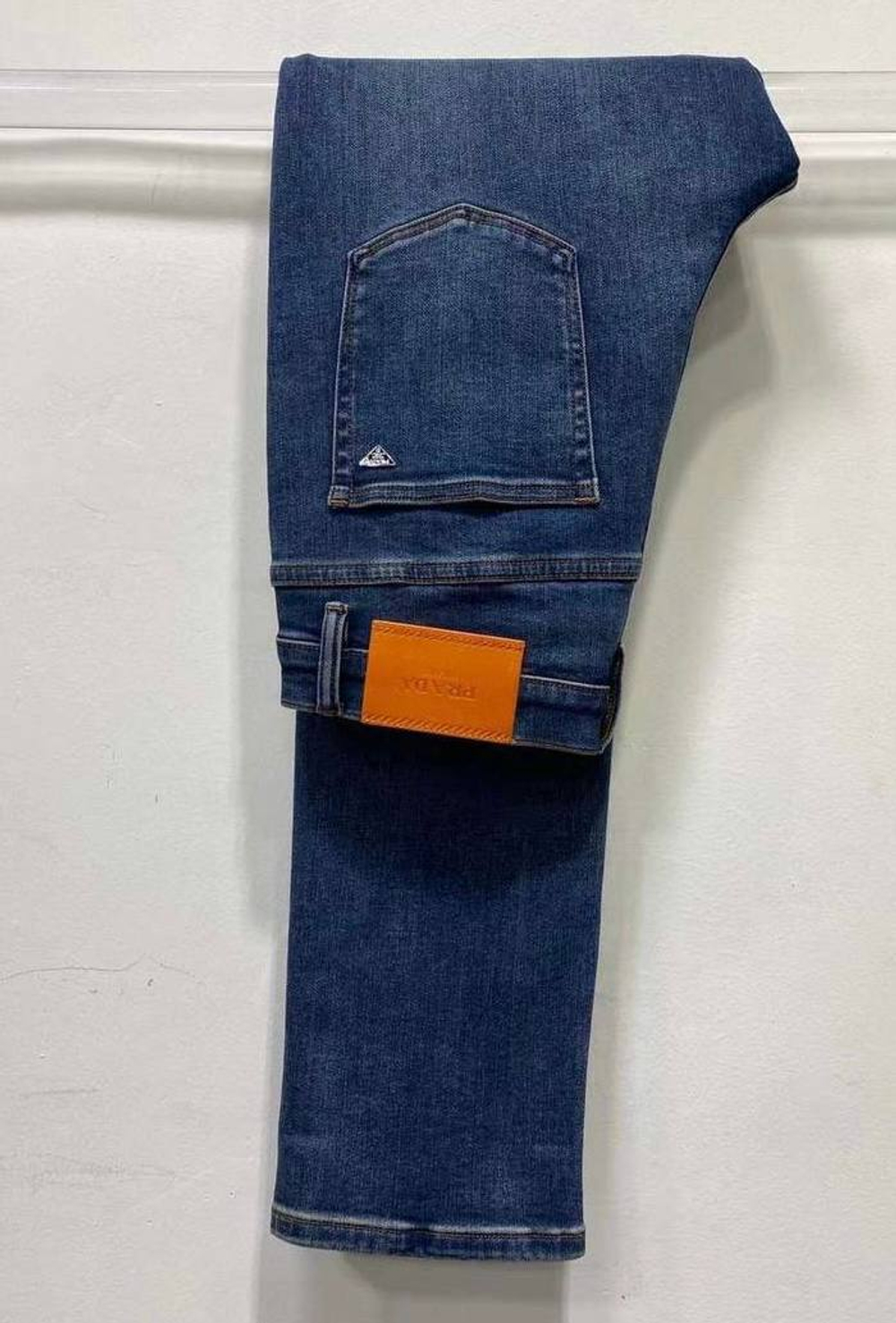 Джинсы Prada