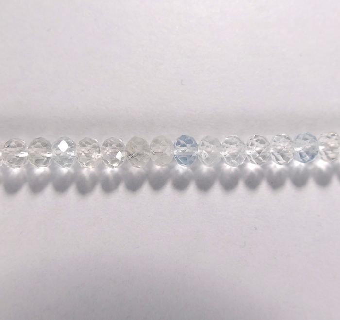 Бусина из топаза бесцветного, фигурная, 4x6 мм (рондель, граненая)