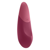 Темно-розовый клиторальный вибратор 14,2см Womanizer Vibe Rose WZFS1SG3