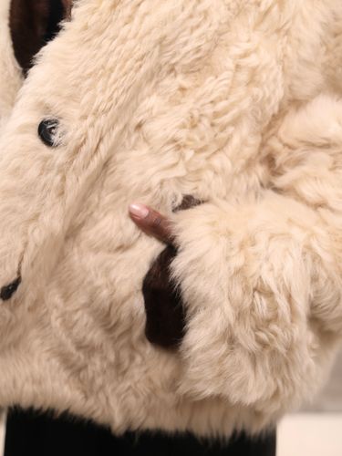 Короткая бежевая шуба из овчины со вставками из меха норки