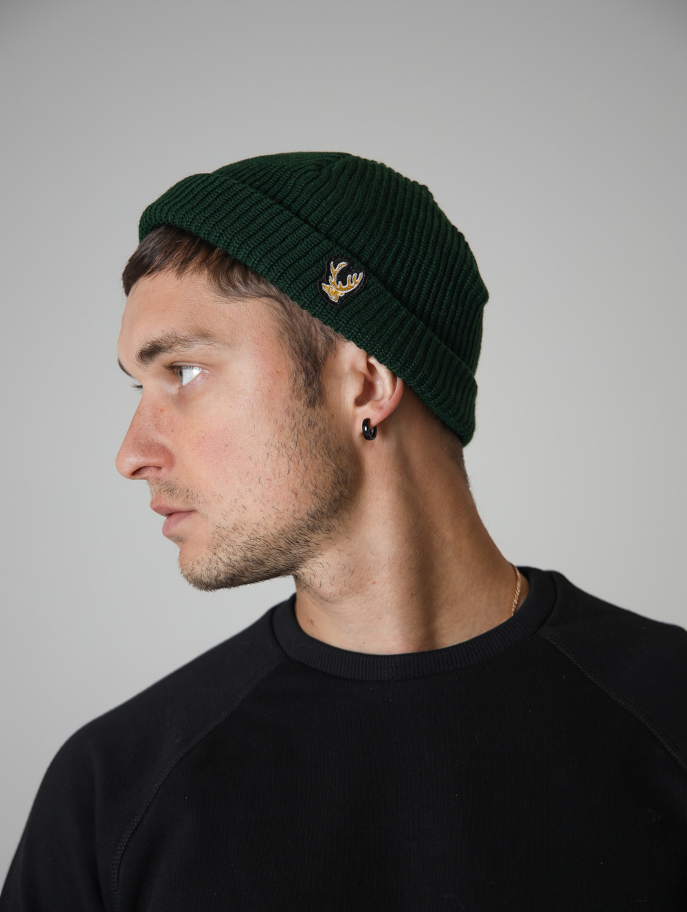 Шапка короткая зеленая Город Горький олень желтый