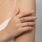 Кольцо «Лебедь» из комбинированного золота с топазами и натуральными топазами white