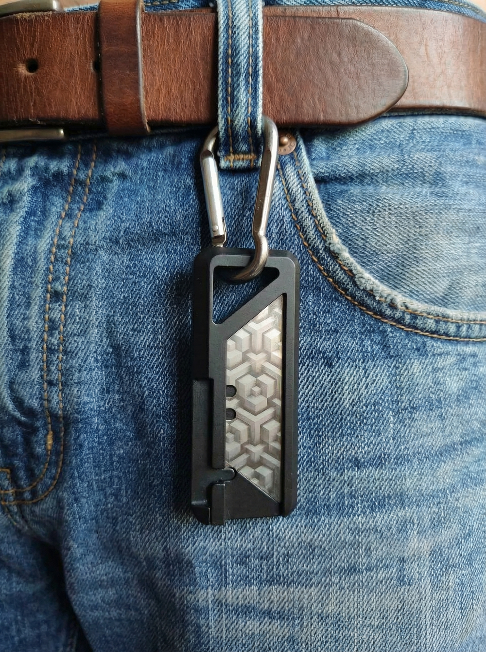 Нож для сменных трапециевидных лезвий.