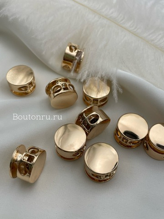 Фиксатор для шнурков плоский золотистый