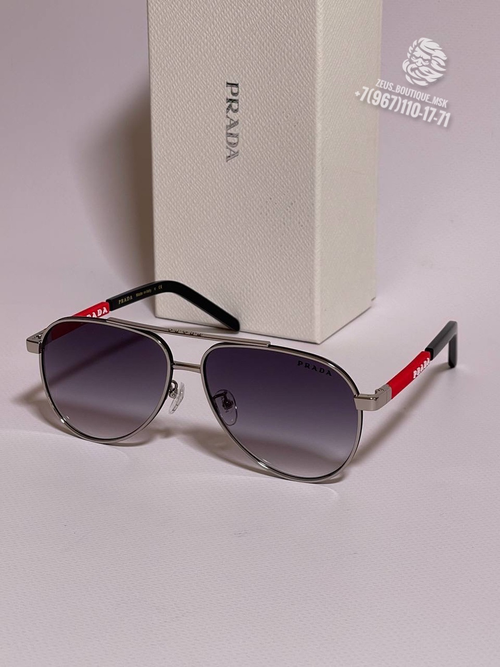 Солнечные очки Prada