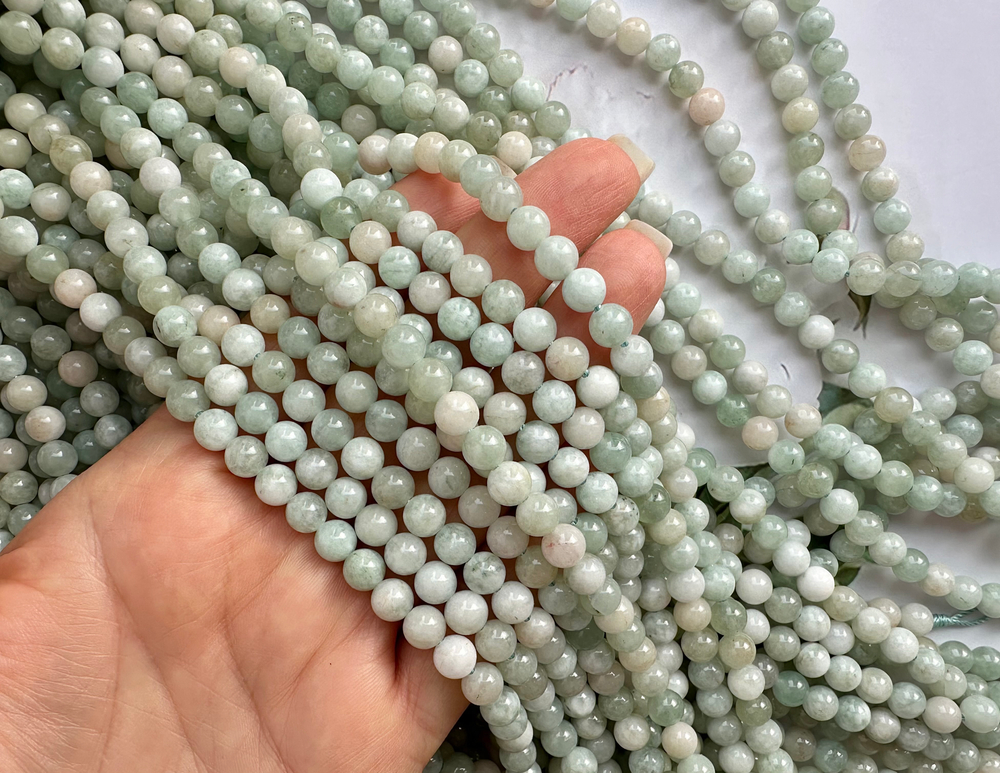 Нить бусин из тонированного кварца 6,4мм, гладкие