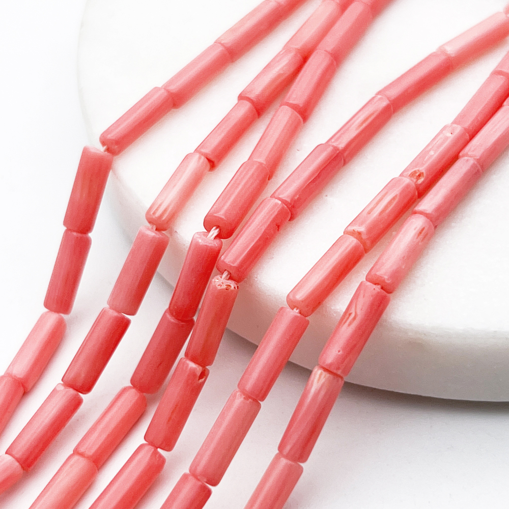 Коралл тонированный бусины, размер около 9,3*3,2 мм, цена за 20-21 шт (1/2 нити)