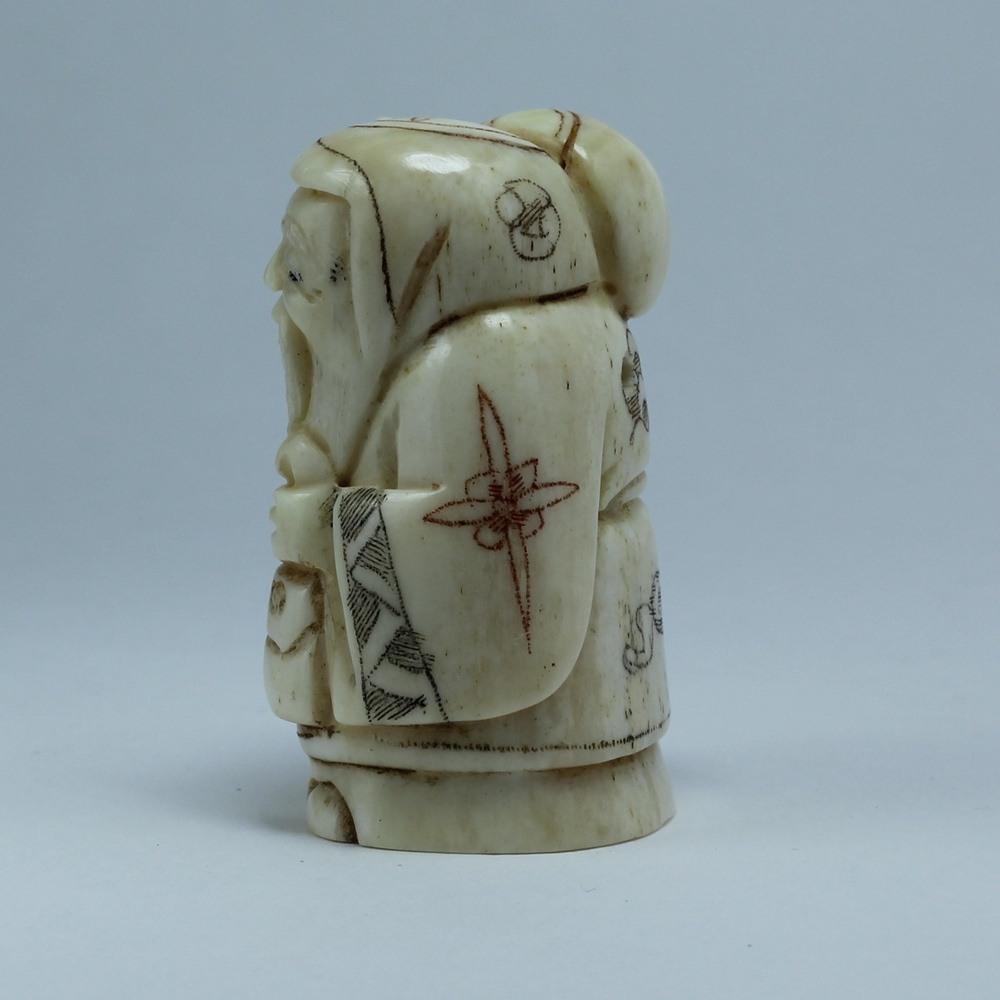 Нэцкэ Фукурокудзю с мешком и кисетом