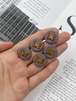 Пуговицы текстильные серые с золотом