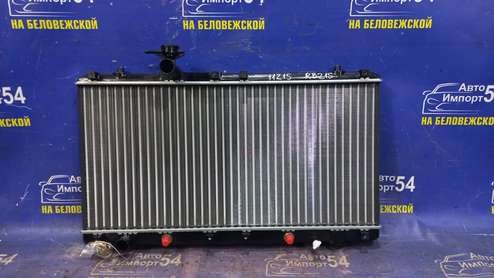 Радиатор двигателя SUZUKI AERIO 2001-2005