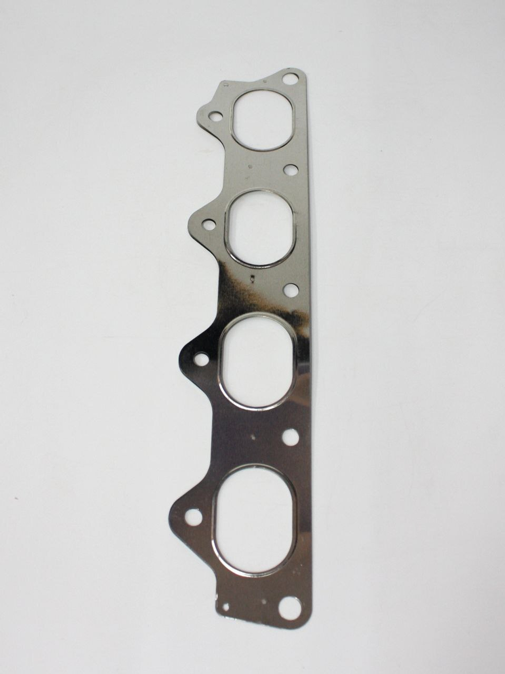 Прокладка выпускного коллектора SMD181032 Chery Cross Eastar, Eastar, Tiggo