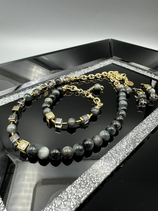 Браслет асимметричный с кошачим глазом и кубиками Swarovski, оттенок золото