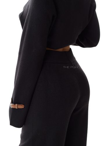 Черный трикотажный костюм с брюками