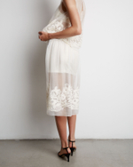 Юбка из шелка с вышивкой молочный