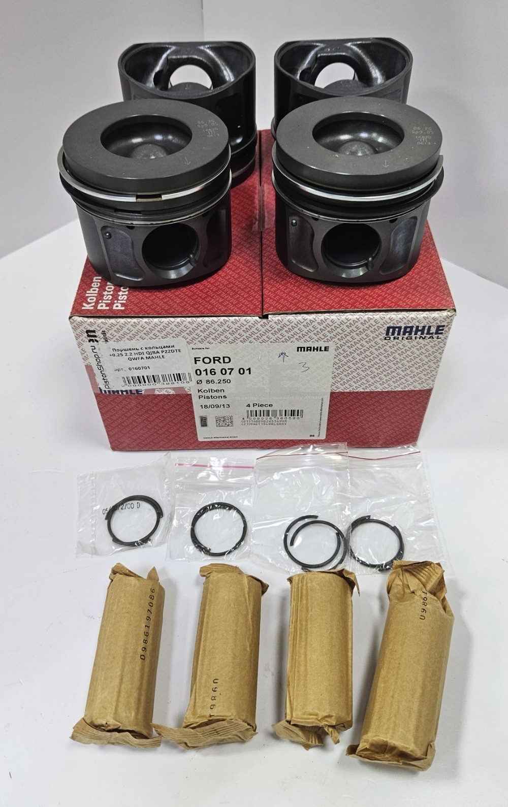 Поршни с кольцами +0,25 QJBA FORD TRANSIT MAHLE