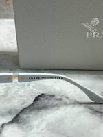 Солнечные очки Prada