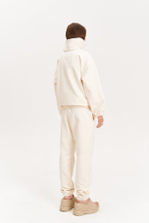 Брюки из утепленного трикотажа, молочные