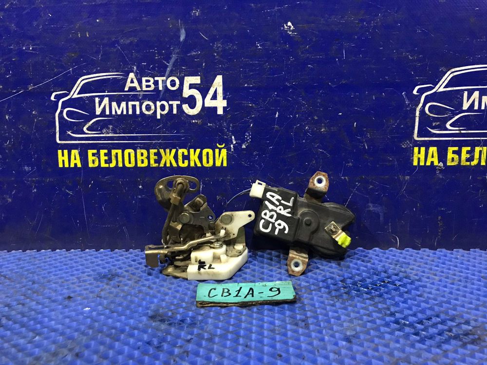 Замок двери задней левой MITSUBISHI LANCER 1994