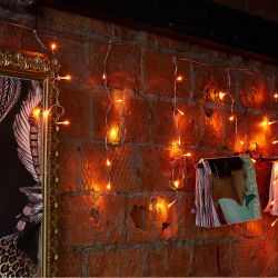 ULD-B12006-195-TTK AMBER IP44 Бахрома светодиодная с эффектом мерцания. 12м. Соединяемая. 195 светодиодов. Янтарный свет. Провод прозрачный. ТМ Uniel