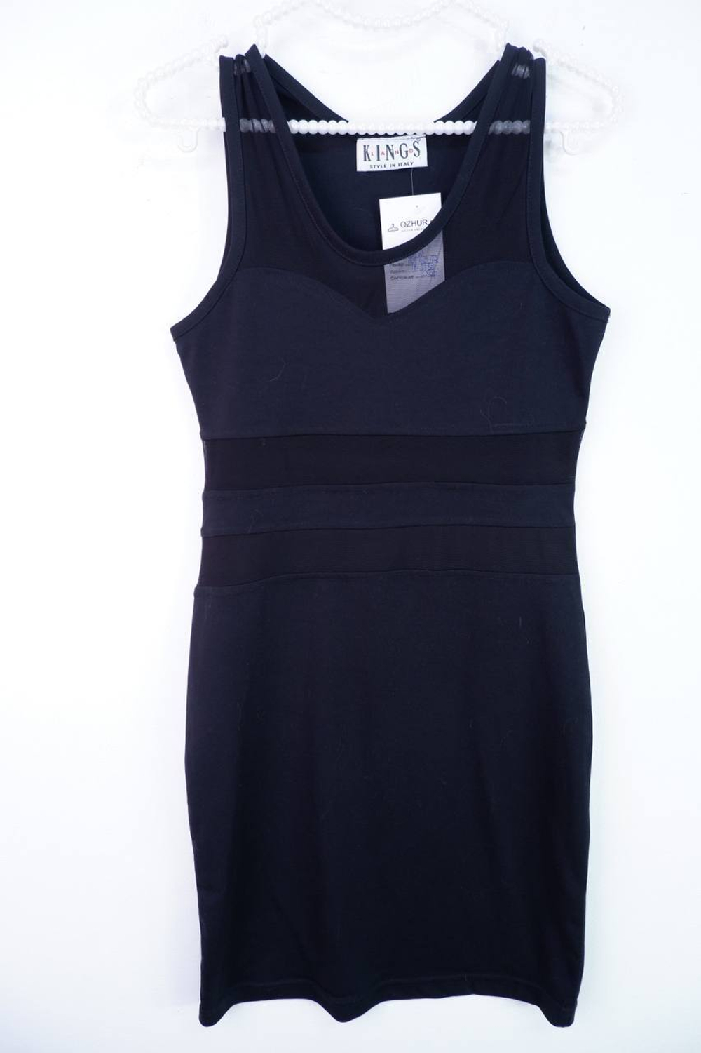 Платье обтягивающего кроя, визуально на 40/42 размер