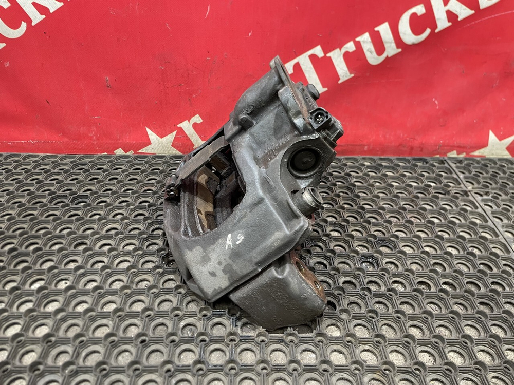 Суппорт передний левый