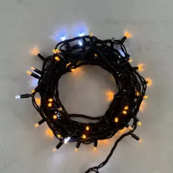 Гирлянда Нить 10 м., Желтая с Мерцанием Белого Диода 220В, 75 LED, Провод Черный Каучук, IP65, LTC (LL75BLW-1-2Y)