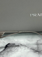 Очки Prada